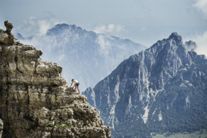 Killian Jornet scaling a mountain