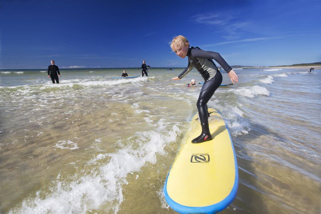 Surfing at Pollan Bay