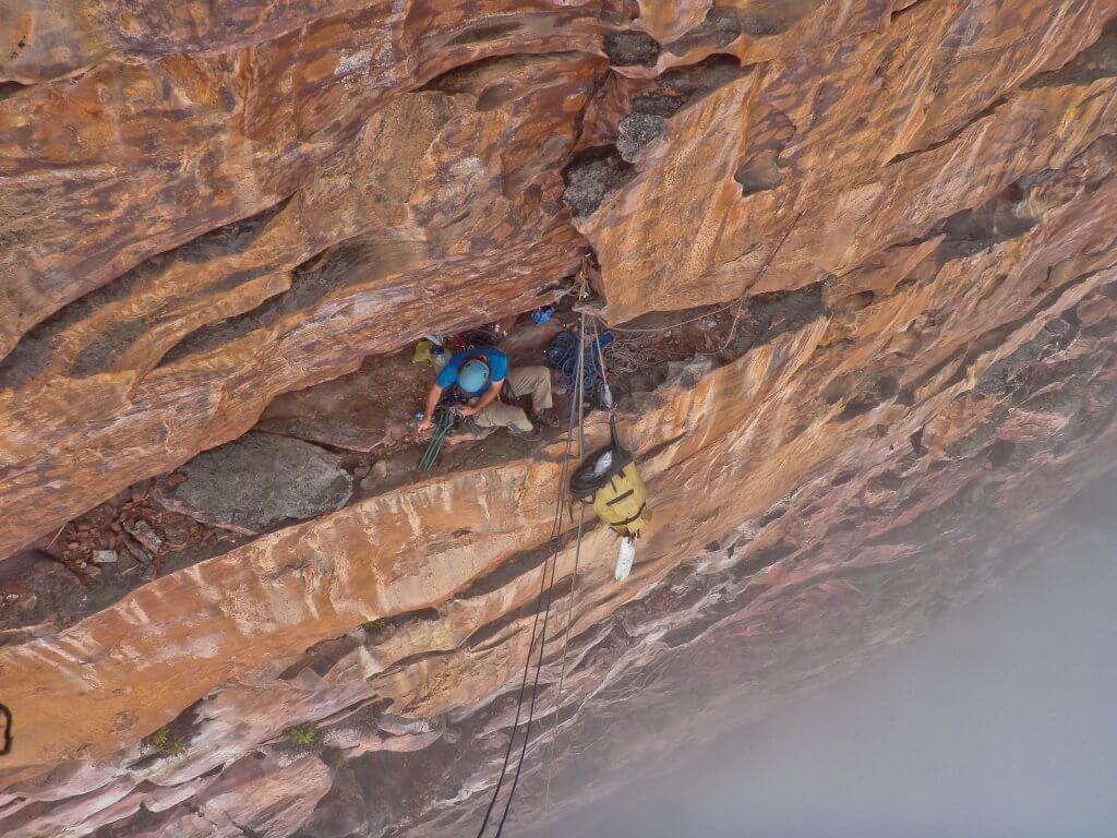 Climbing up to a ledge on Upuigma Tepui