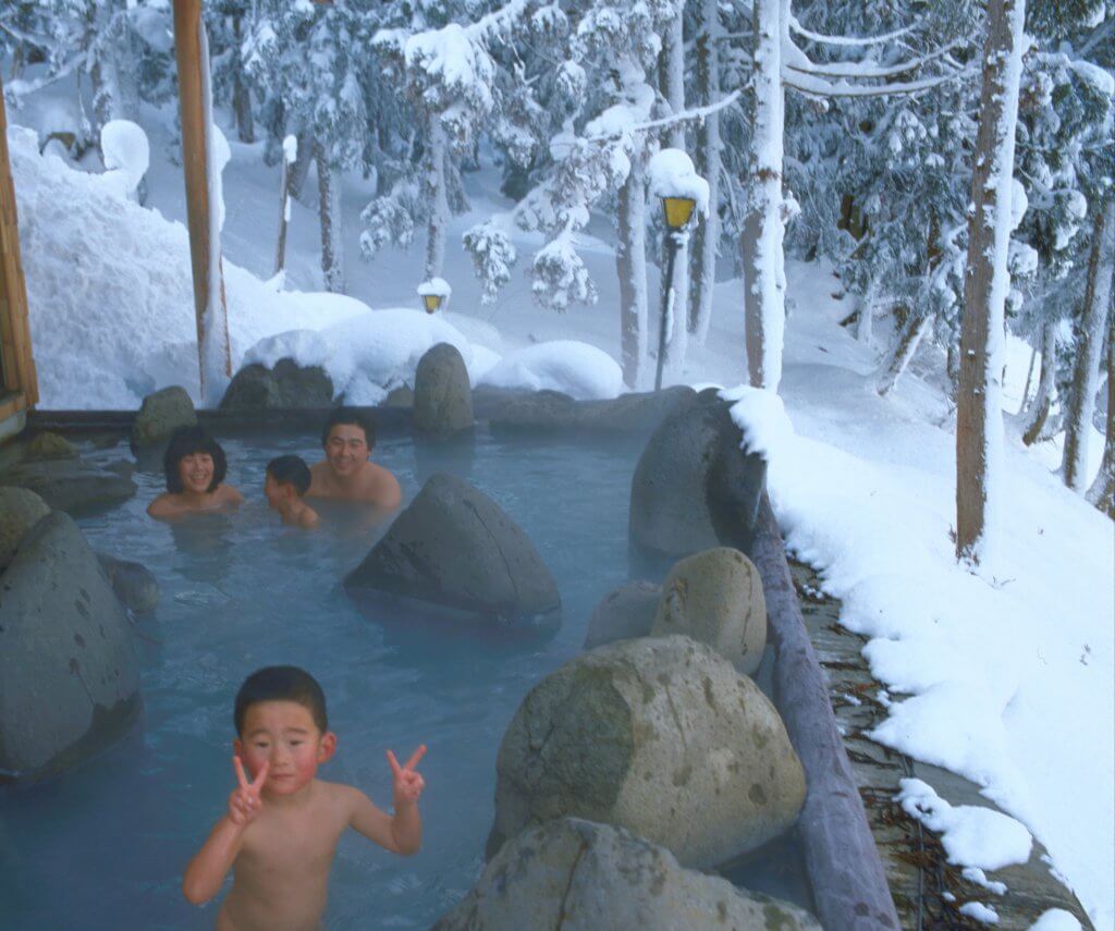 Family in an onsen