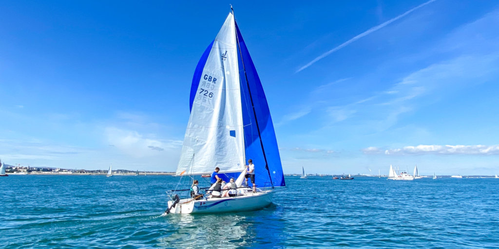 RNLI crew member Jennie Harris sailing