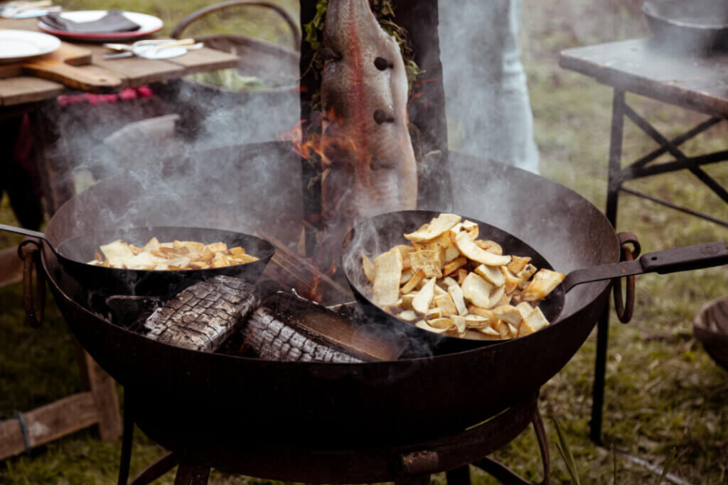 Foraged food cooking over the fire