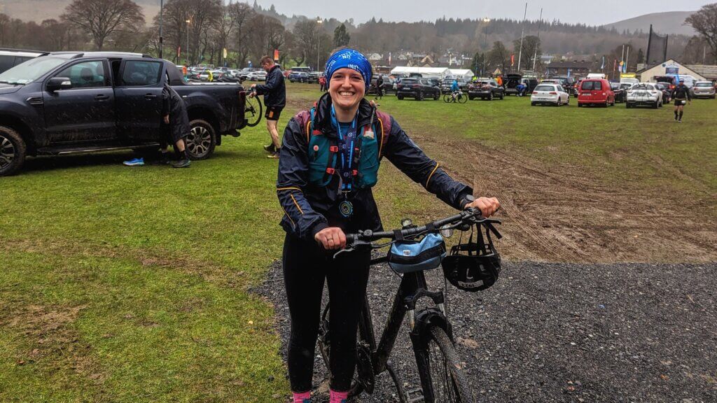 All smiles at the finish line of a soggy Quest Glendalough